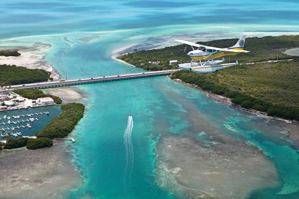 seaplane flying above water