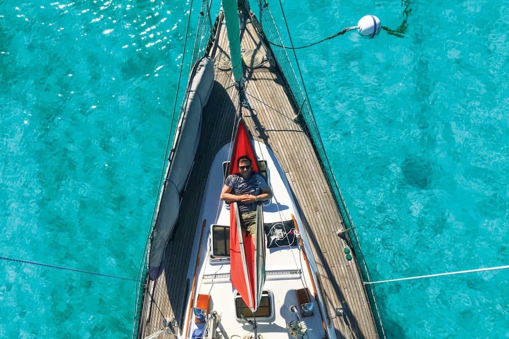 Sam Weigel in a hammock aboard his yacht