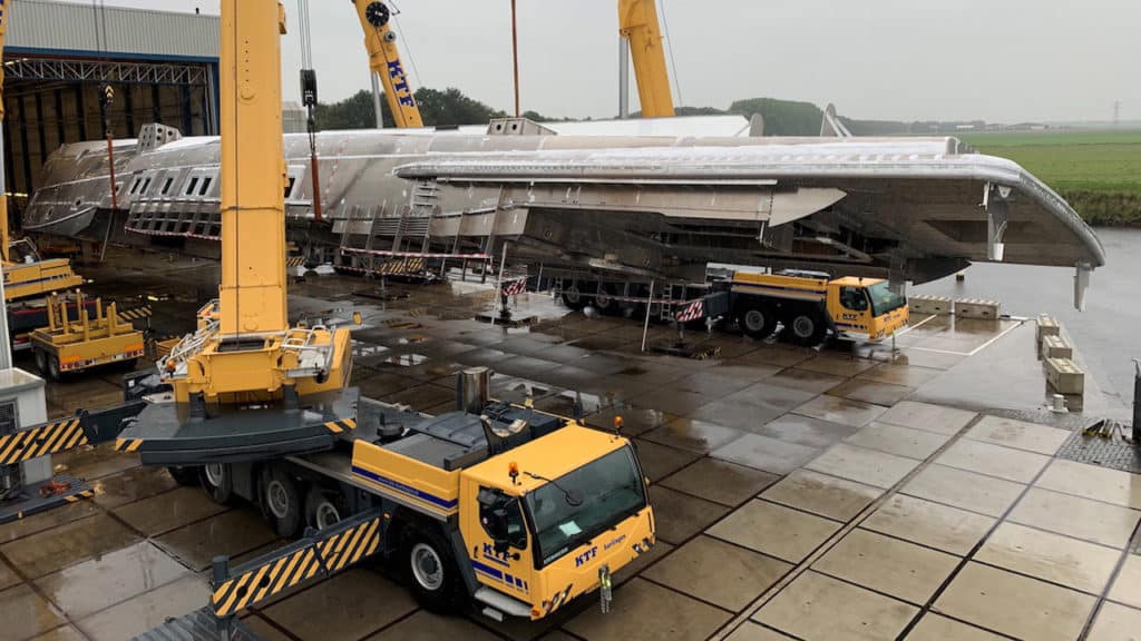 Superyacht hull being flipped