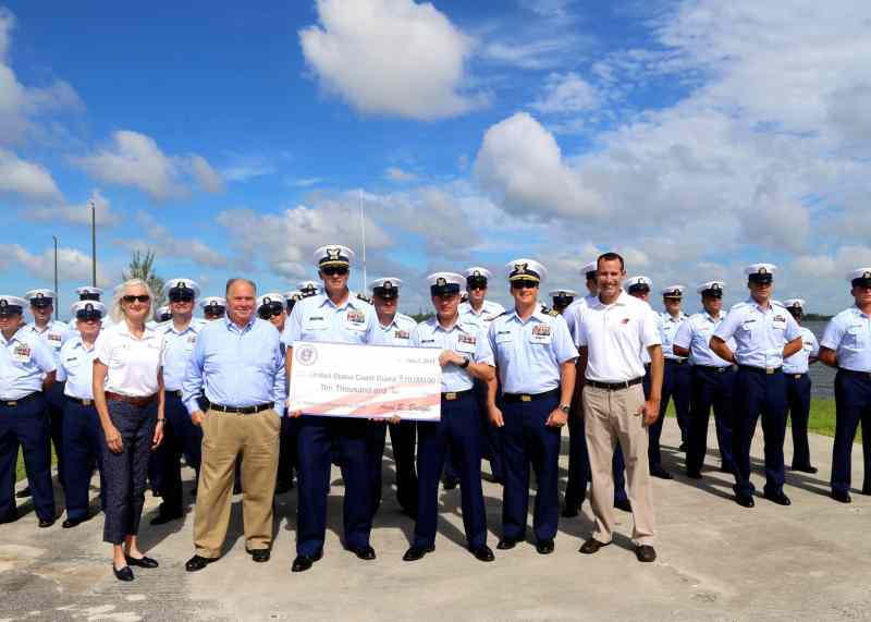 Members of the U.S. Coast Guard join Coast Guard Foundation board members VADM Sally Brice-O’Hara, USCG (Ret.) and David Dyer, and Coast Guard Foundation staff member Brian Overcast.