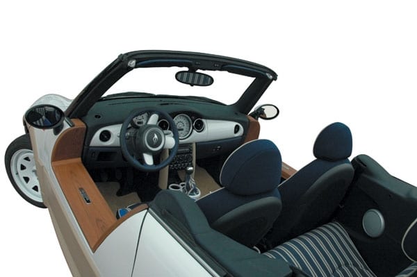 Toys for Yachts The Ultimate Land Yacht Castagna recently debuted the Tender for land cruising: an open-air cabriolet with a 30-liter freshwater tank with shower and a 2000W Clarion audio system and extra spotlights (for beach parties). The striped soft top is by Missoni, while the interior has neoprene-covered seats to stand up to sun and saltwater. Lifting rings at each corner make it easy to sling the car aboard. You have to buy the Mini Cooper (starting at $17,450) first, and then figure about $25,000 for the custom conversion. www.castagnamilano.com