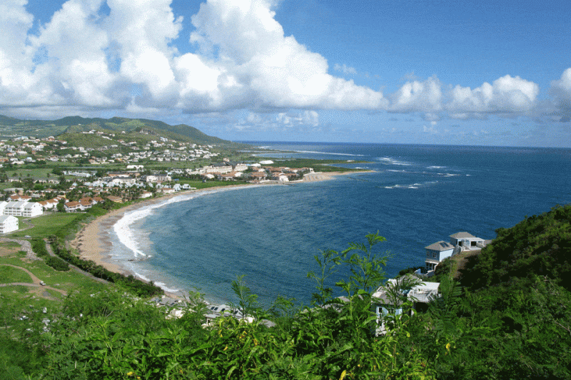 frigate-bay-st.-kittss.gif I’d only been to St. Kitts once. It was about a dozen years ago, and I was a guest aboard a charter yacht. We took the tender ashore on Turtle Beach and had lunch at a charming island rum shop. Green monkeys roamed free, waiting for the occasional handouts of sliced fruit. Fresh seafood sizzled on a kettle grill and the sound system played Caribbean music — a perfect accompaniment to the small waves lapping on the beach. The simple West Indies-style bar had a one-room apartment for rent above it, and for many years afterward, I’d pull up the restaurant’s website and think about leasing that apartment when I was craving an unpretentious island escape. So I was excited when the representative from the St. Kitts Tourism Authority said we’d conclude my recent island tour with a visit to Reggae Beach, the rum shop I had loved. To be honest, the 2 1/2-hour tour hadn’t done the island justice. During most of the day, the rep was snuggled into the van seat in front of me, mildly car sick, only weakly raising her head to point out the churches we passed. “There’s the Anglican church. … There’s the Catholic church. … There’s the Seventh Day Adventist church. … ” When we pulled into Reggae Beach, I realized the parade of churches was going to be the high point of the tour after all.