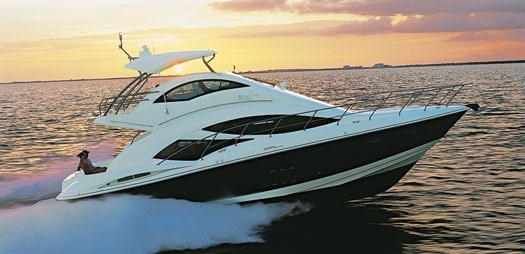 Cruisers Yachts 477 RAKISH RIDE: Arched side windows and super-structure curves align for unforgettable elegance.