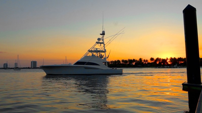 Yacht in the water at sunset