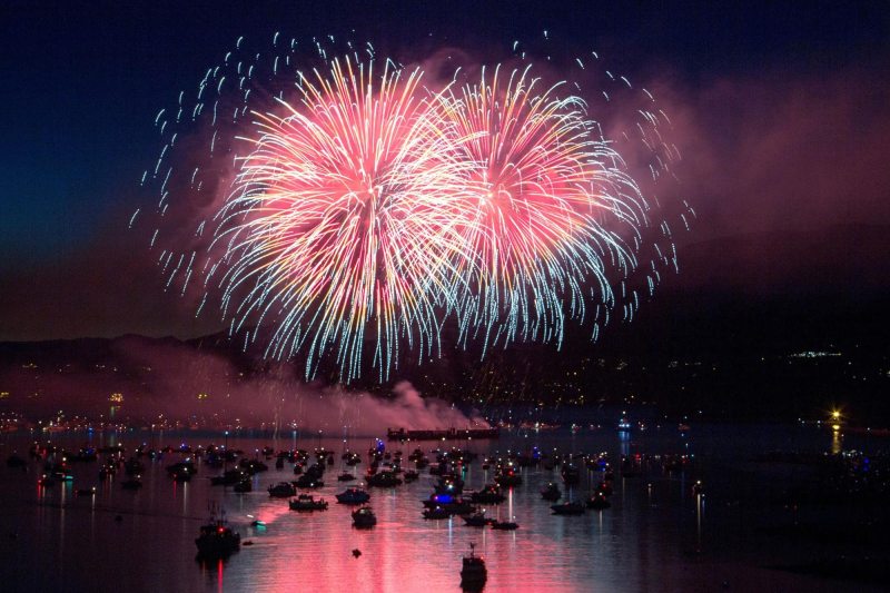Boats gathered under fireworks